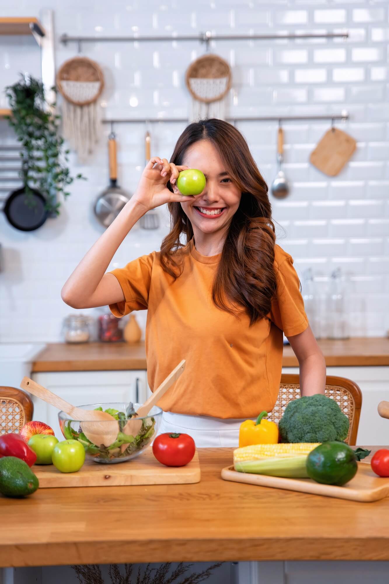 beautiful-young-woman-happy-portrait-cooking-fresh-organic-clean-food-fruit-at-home-modern-kitchen-3.jpg
